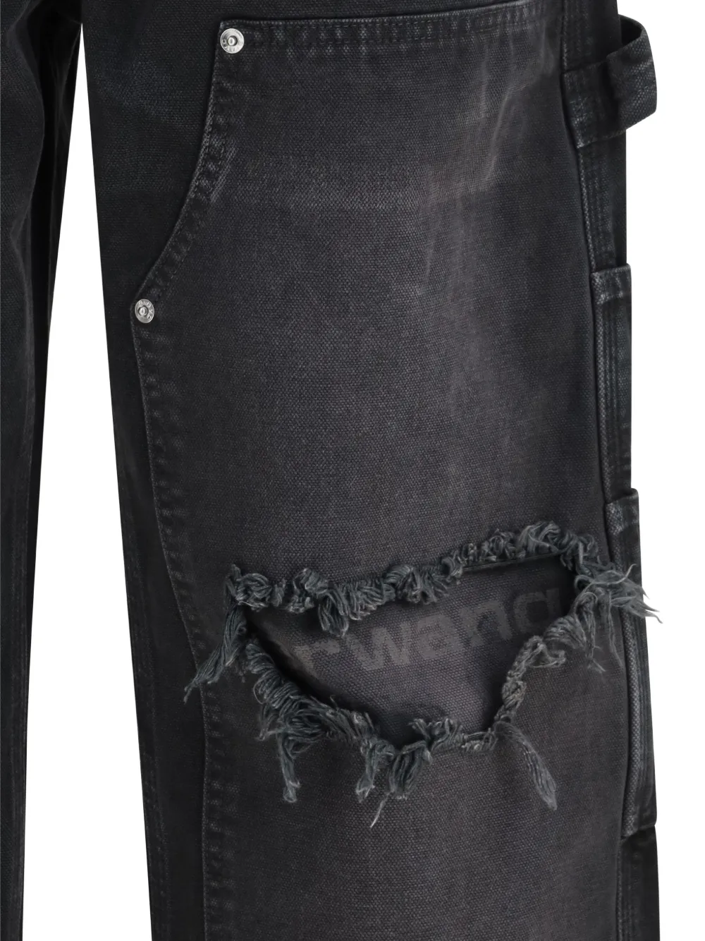 Close up of Black jeans, showing texture of the cotton fabric