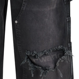 Close up of Black jeans, showing texture of the cotton fabric