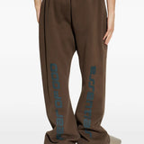 Brown pants worn by a person, showing the pants fit