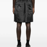 Black short worn by a person, showing the short fit