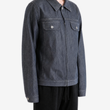 Grey jacket worn by a person, showing the jacket fit