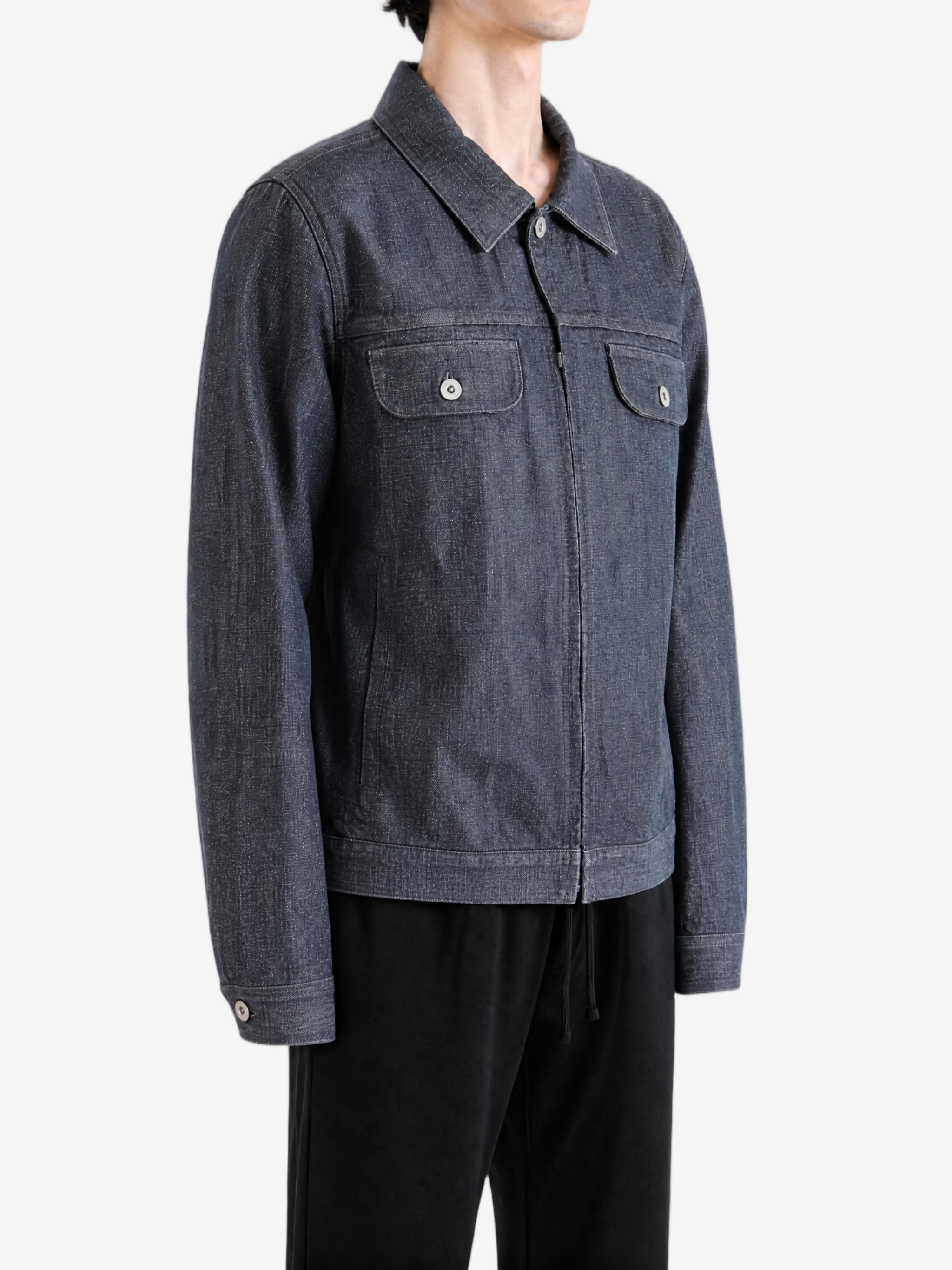 Grey jacket worn by a person, showing the jacket fit