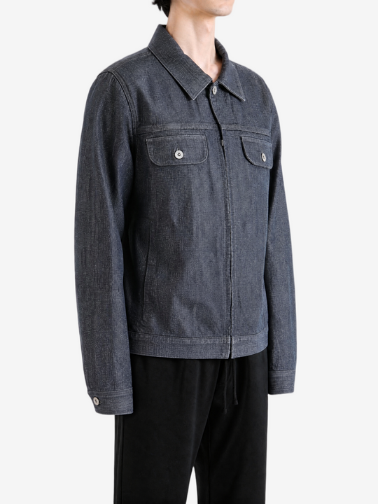 Grey jacket worn by a person, showing the jacket fit