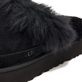 Close up of black boots, showing texture of the Suede fabric