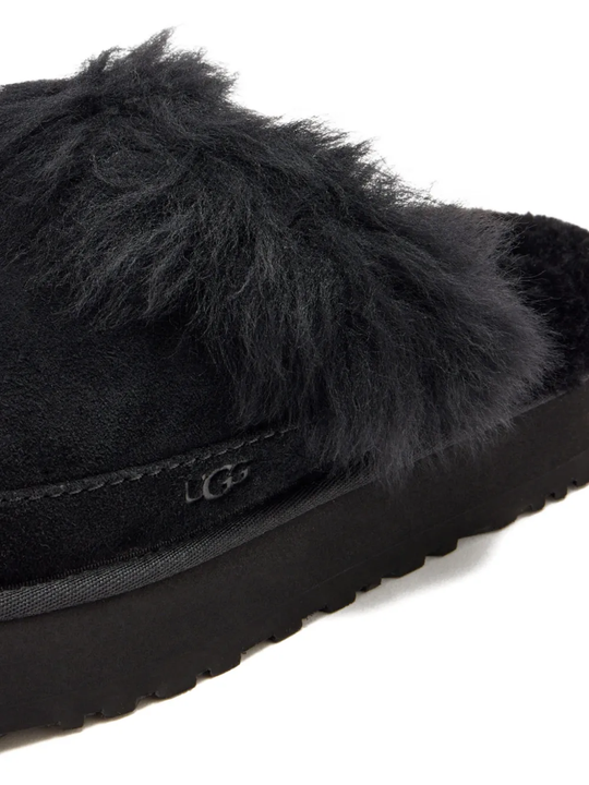 Close up of black boots, showing texture of the Suede fabric