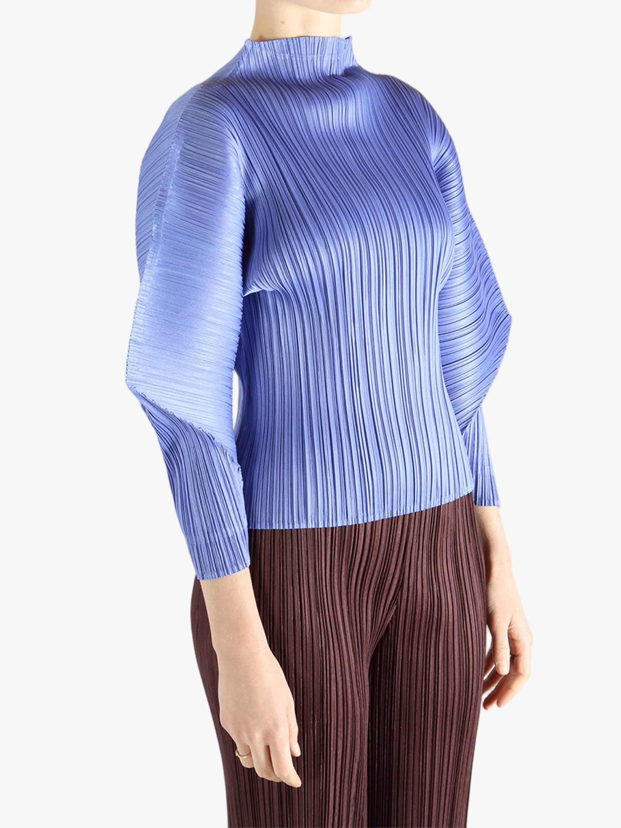 Blue shirt worn by a person, showing the shirt fit