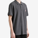 Grey t-shirt worn by a person, showing the t-shirt fit
