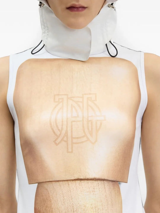 Tan top worn by a person, showing the top fit