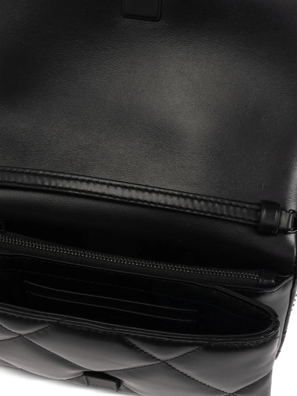 Close up of black bags, showing texture of the calf leather fabric