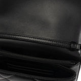 Close up of black bags, showing texture of the calf leather fabric