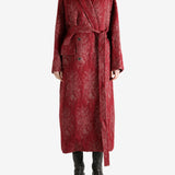 Red jackets worn by a person, showing the jackets fit