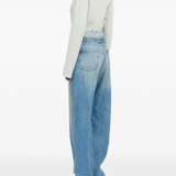 blue jeans worn by a person, showing the jeans fit