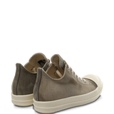 Tan sneakers, side view