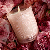 Close up of rose candles, showing texture of the fabric