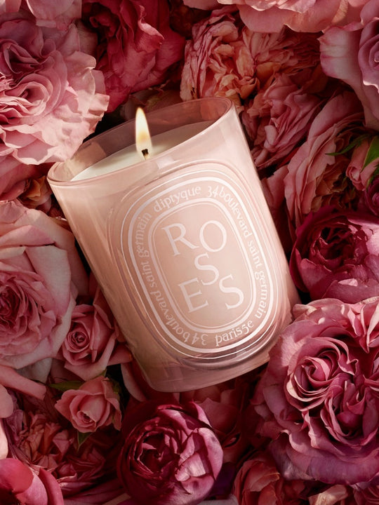 Close up of rose candles, showing texture of the fabric