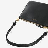 Close up of the black bag, showing texture of the leather fabric