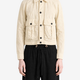 Tan jacket worn by a person, showing the tan jacket's fit