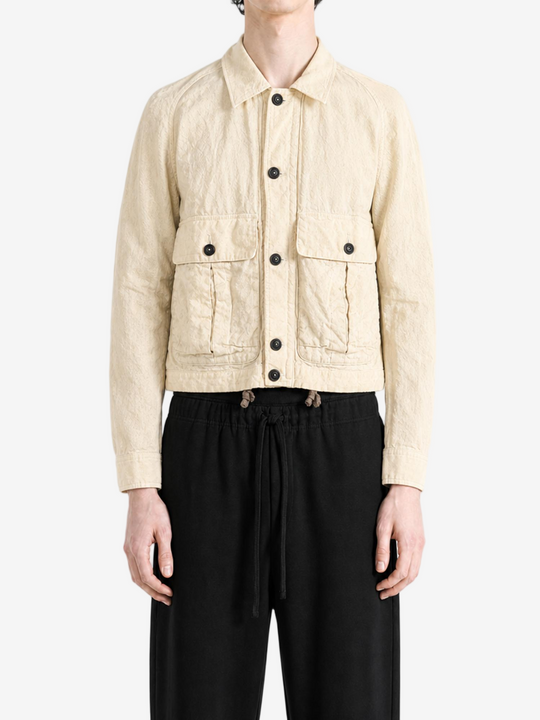 Tan jacket worn by a person, showing the tan jacket's fit