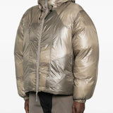 Tan jackets worn by a person, showing the jackets fit