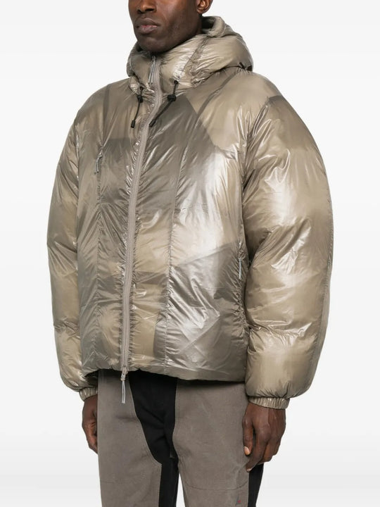 Tan jackets worn by a person, showing the jackets fit