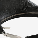 Close up of black bag, showing texture of the fabric