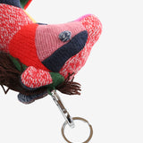 Close up of green keychain, showing texture of the fabric
