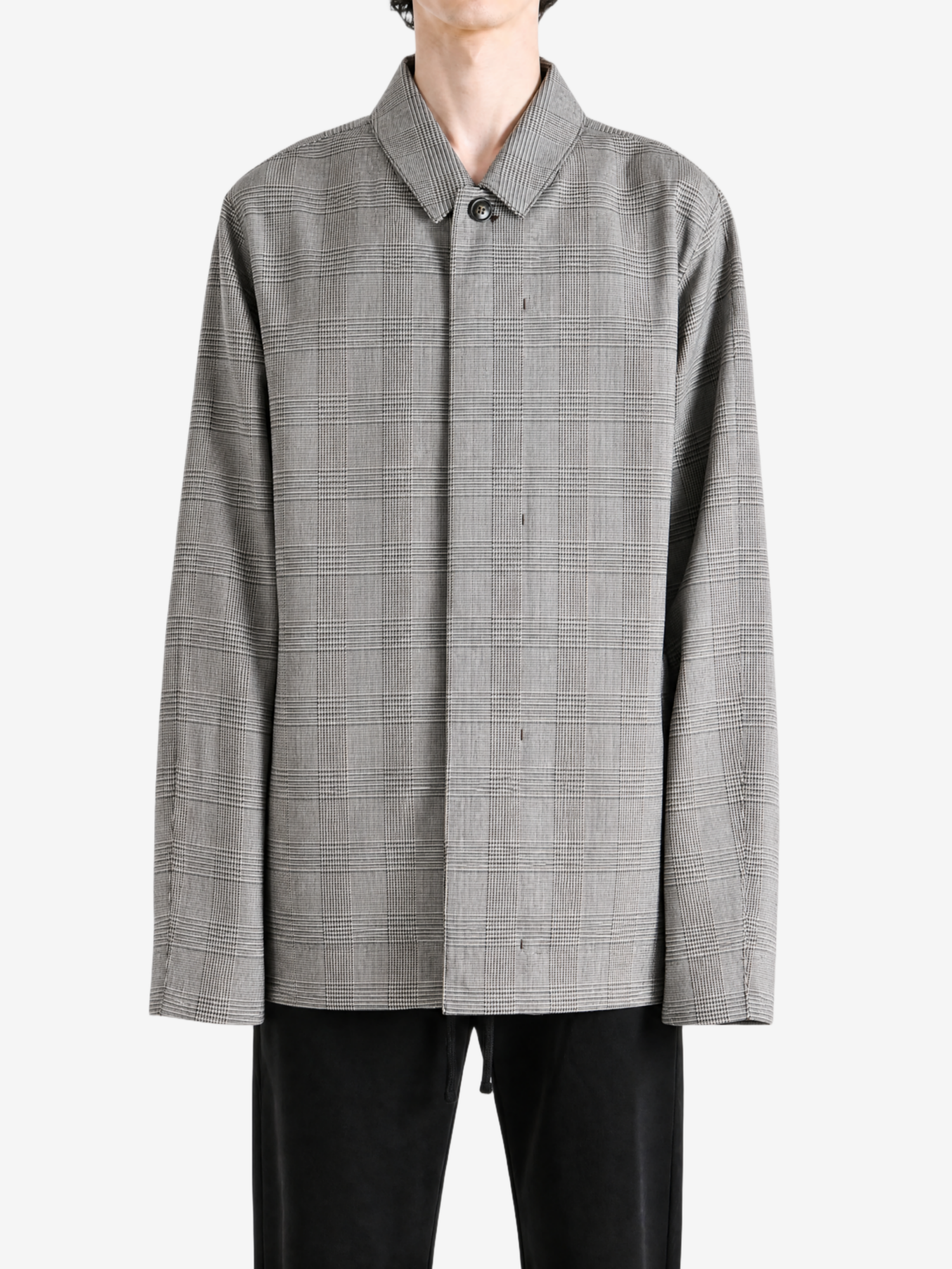 Grey jacket worn by a person, showing the jacket fit