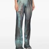 Blue pants worn by a person, showing the pants's fit