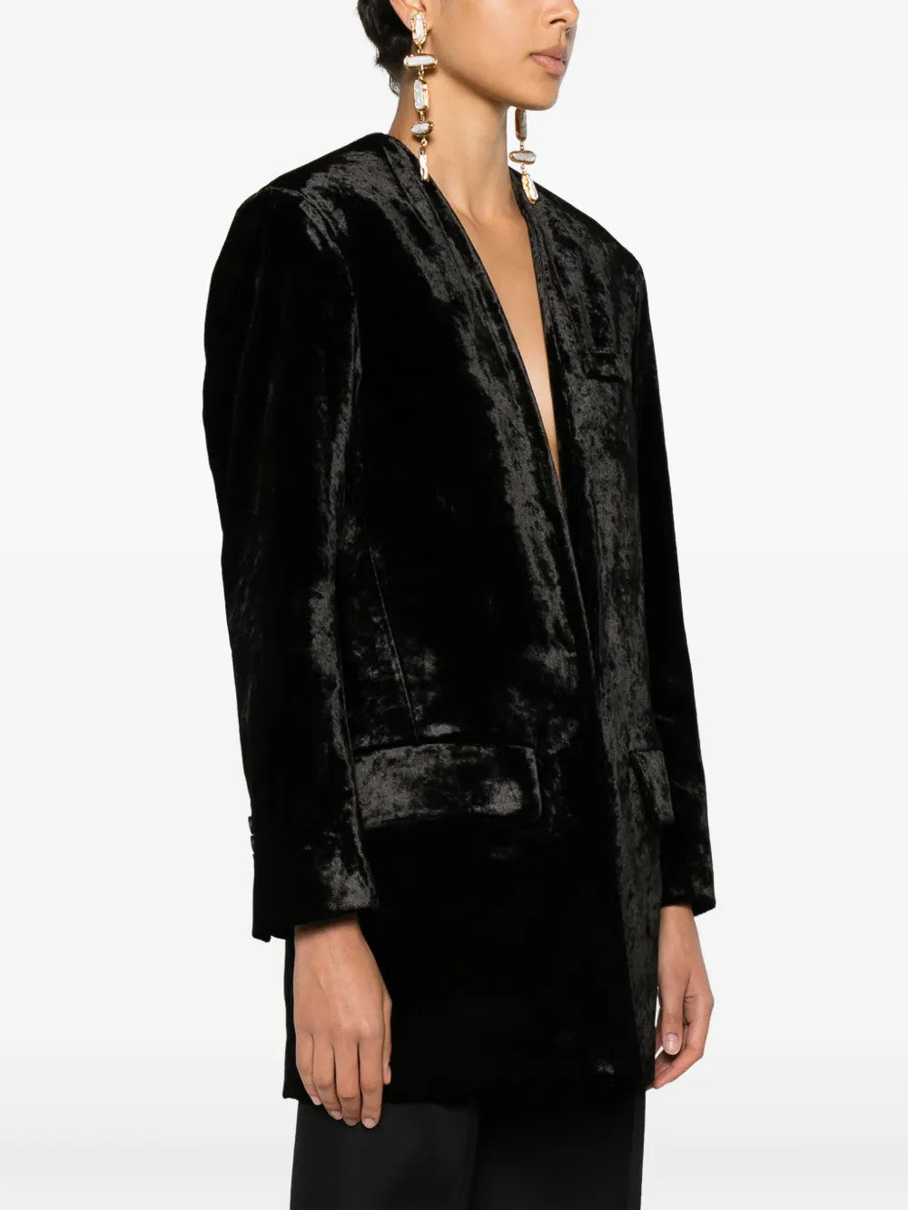 Black jacket worn by a person, showing the jacket fit