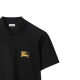 Close up of black t-shirt, showing texture of the cotton fabric