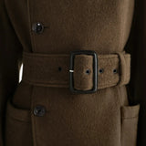 Close up of Brown jacket, showing texture of the 50% wool/ 50% alpaca fabric
