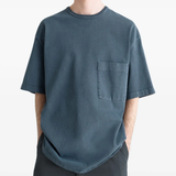 Blue t-shirt worn by a person, showing the t-shirt's fit