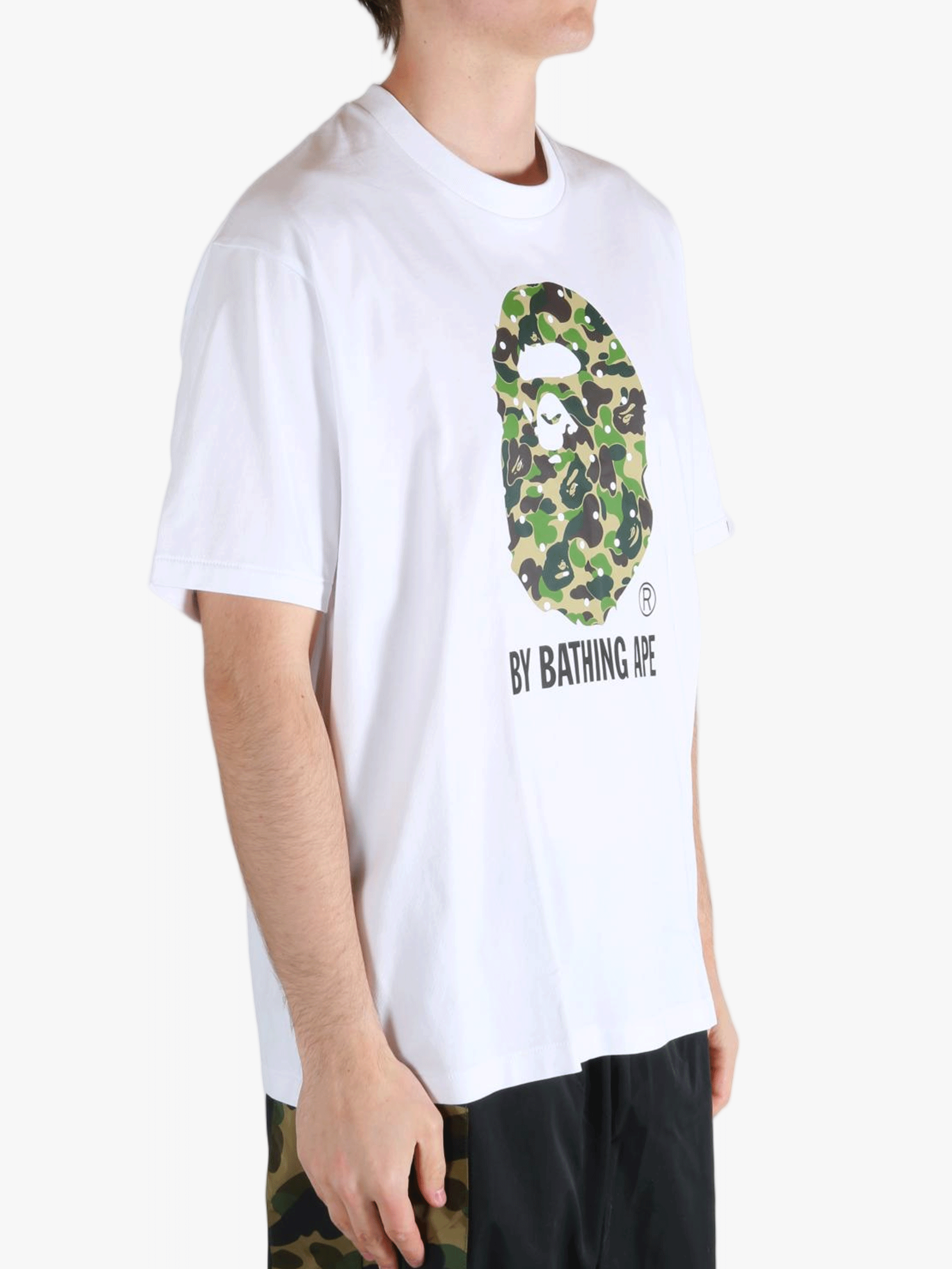 White T-shirt worn by a person, showing the t-shirt's fit