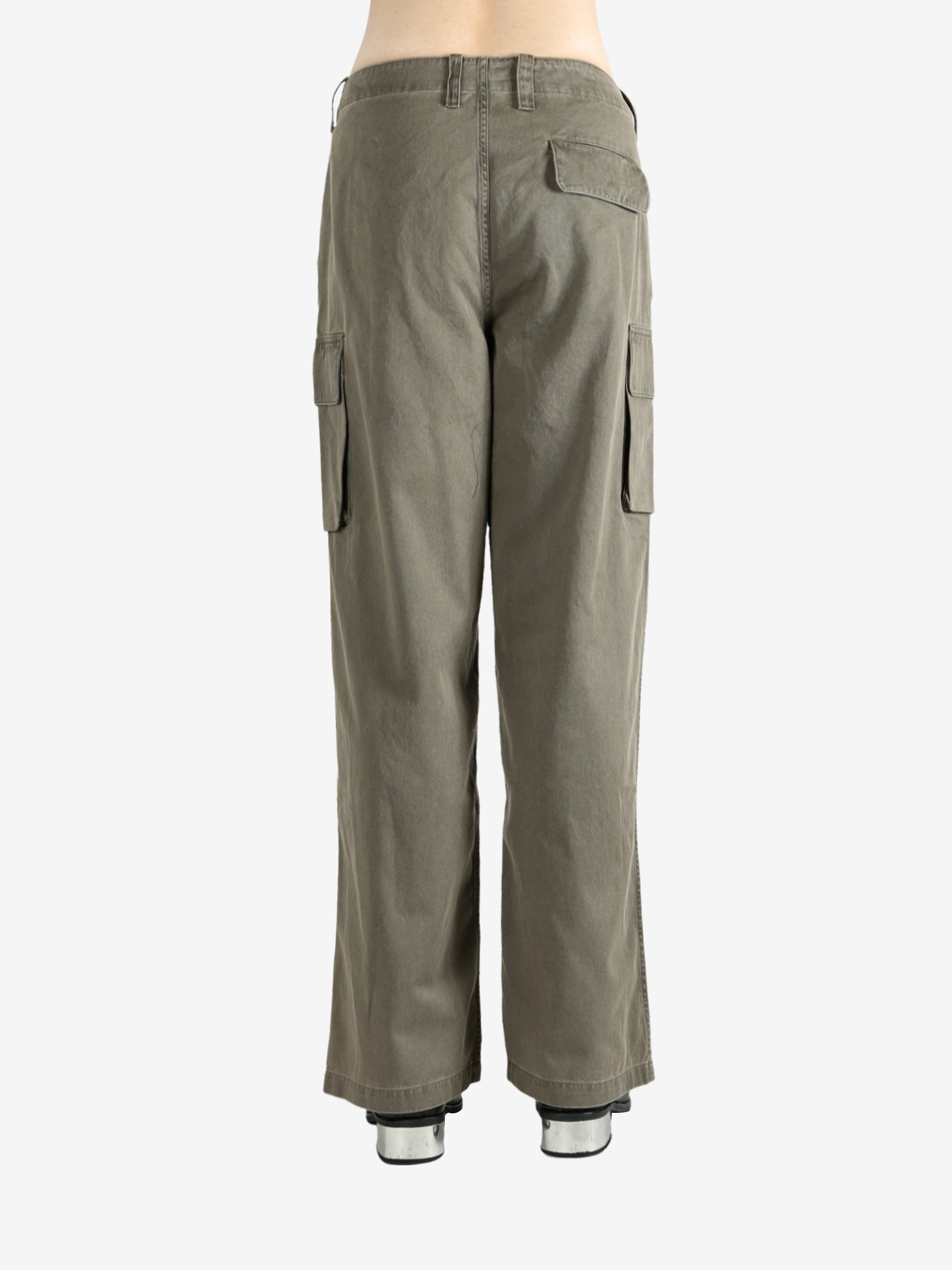 Tan pants worn by a person, showing the pants' fit