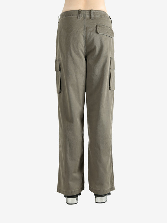 Tan pants worn by a person, showing the pants' fit