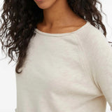 Tan t-shirt worn by a person, showing the t-shirt fit