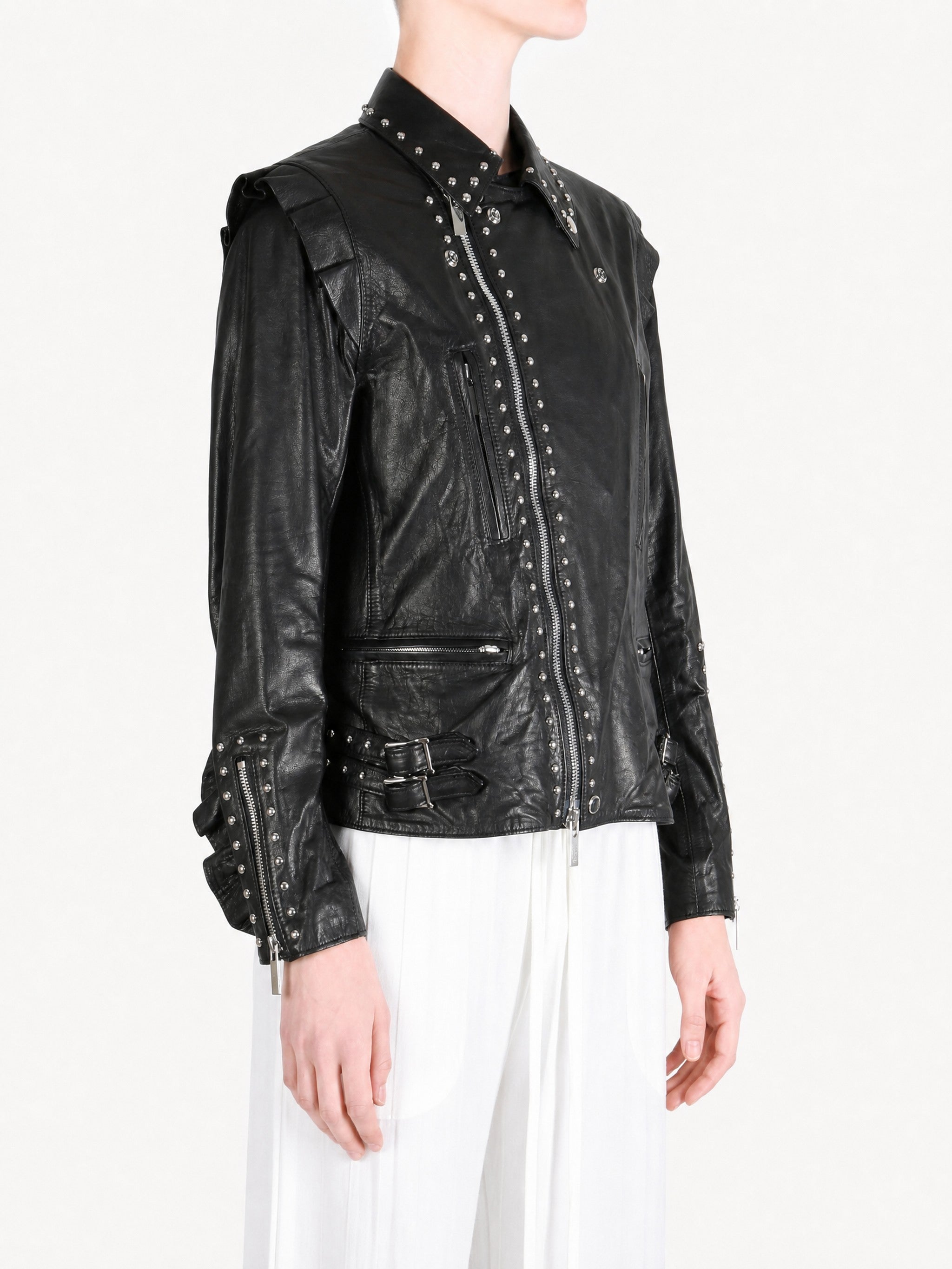 Black jacket worn by a person, showing the jacket fit