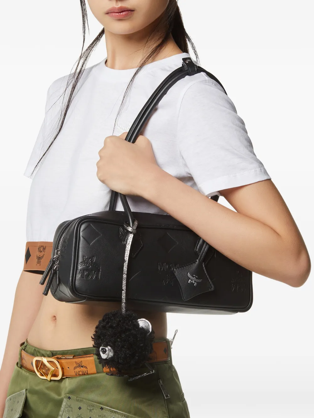 Black bag worn by a person, showing the bag's fit