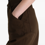Close up of brown pant, showing texture of the Cotton fabric