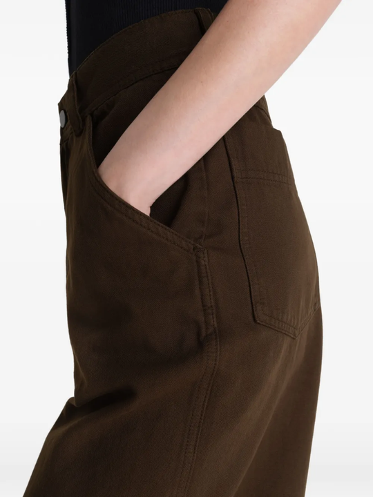 Close up of brown pant, showing texture of the Cotton fabric