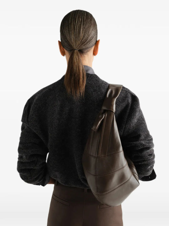 Brown bag worn by a person, showing the bag fit