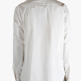 White shirt worn by a person, showing the shirt's fit