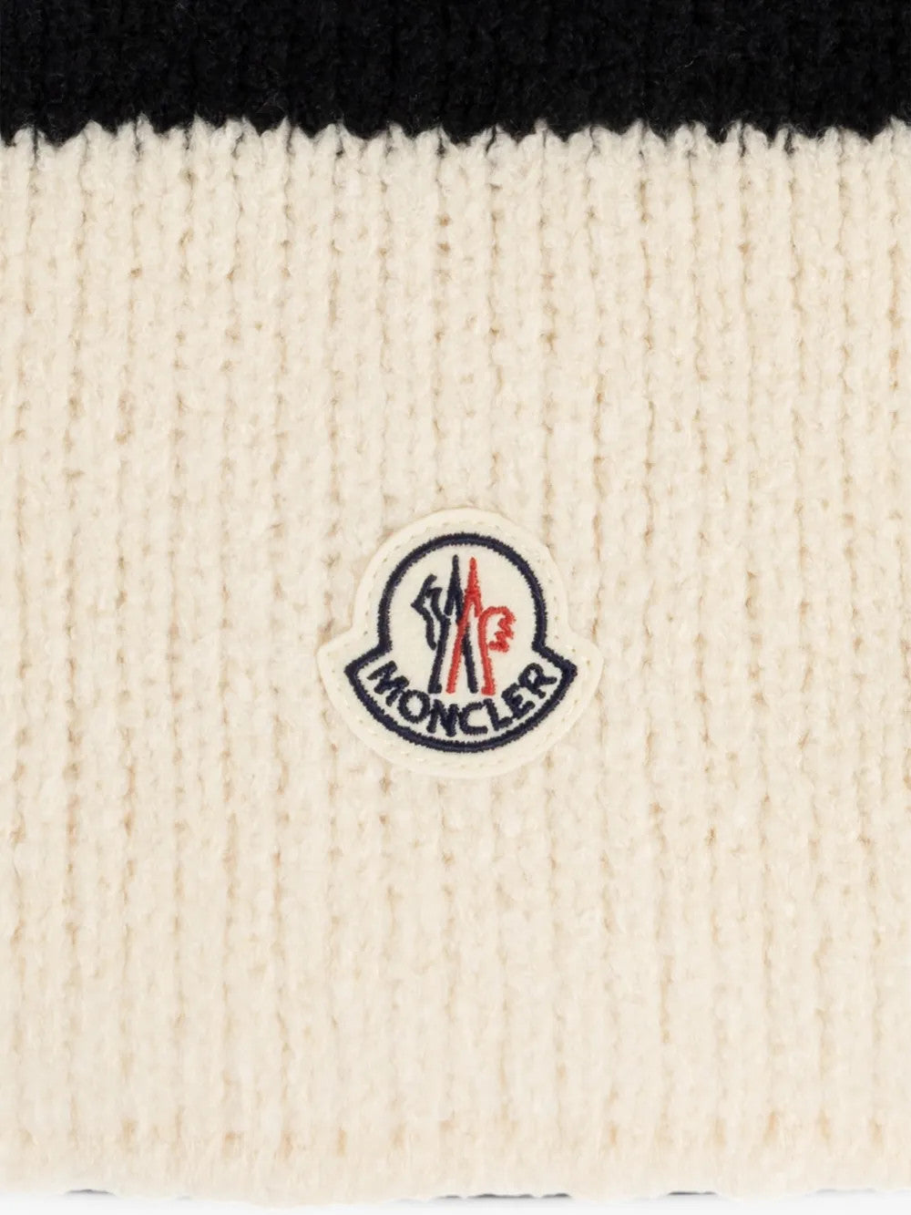 Close up of Tan scarf, showing texture of the 84% wool/ 16% polyamide fabric