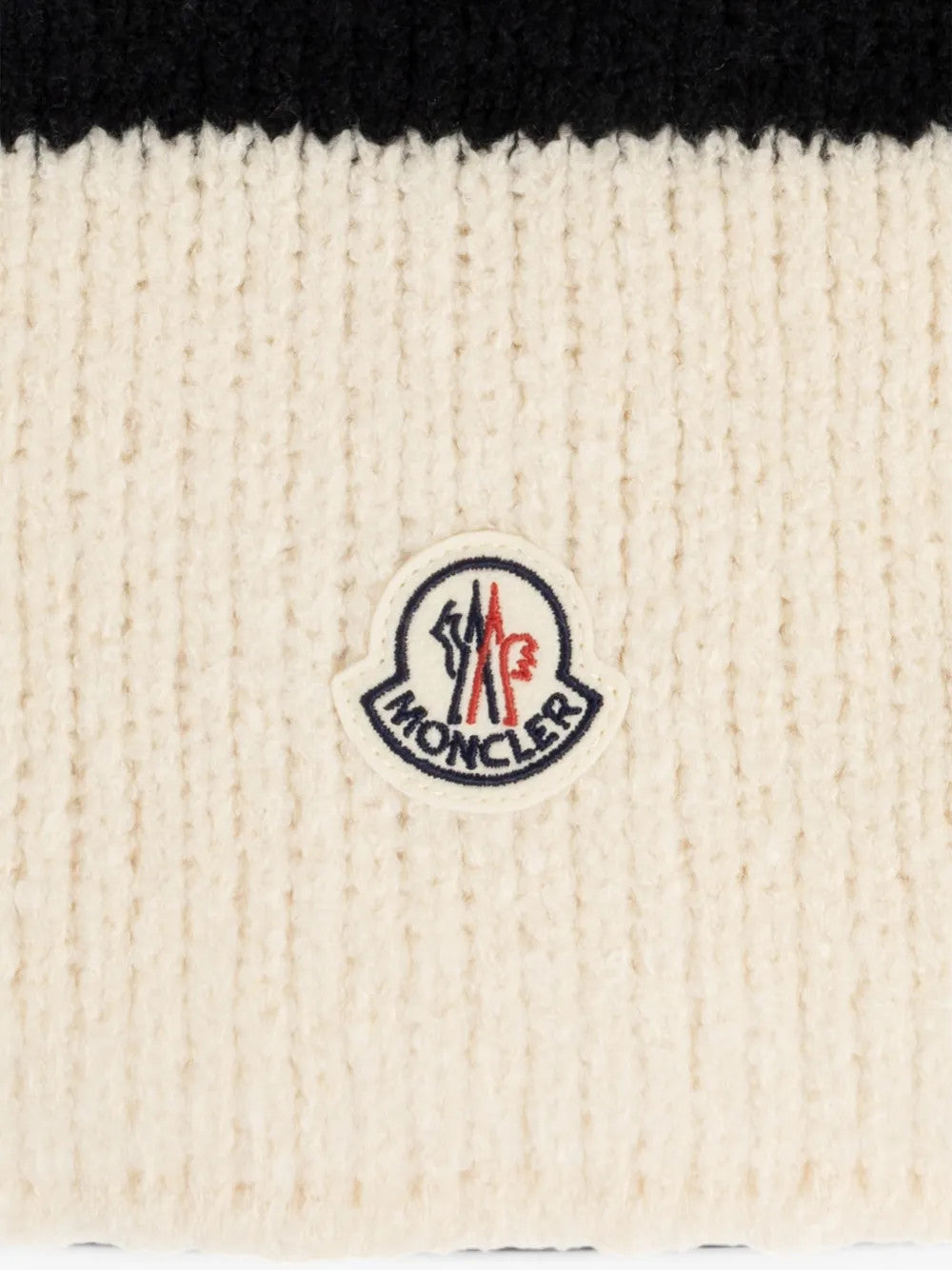 Close up of Tan scarf, showing texture of the 84% wool/ 16% polyamide fabric