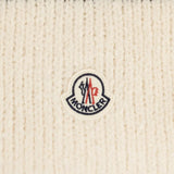 Close up of Tan scarf, showing texture of the 84% wool/ 16% polyamide fabric