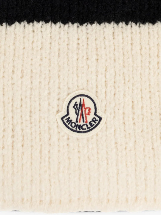 Close up of Tan scarf, showing texture of the 84% wool/ 16% polyamide fabric