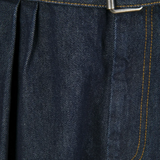 close up of blue pants, showing texture of the cotton fabric