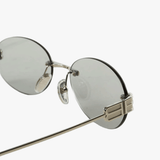 Close up of grey eyewear, showing texture of the fabric