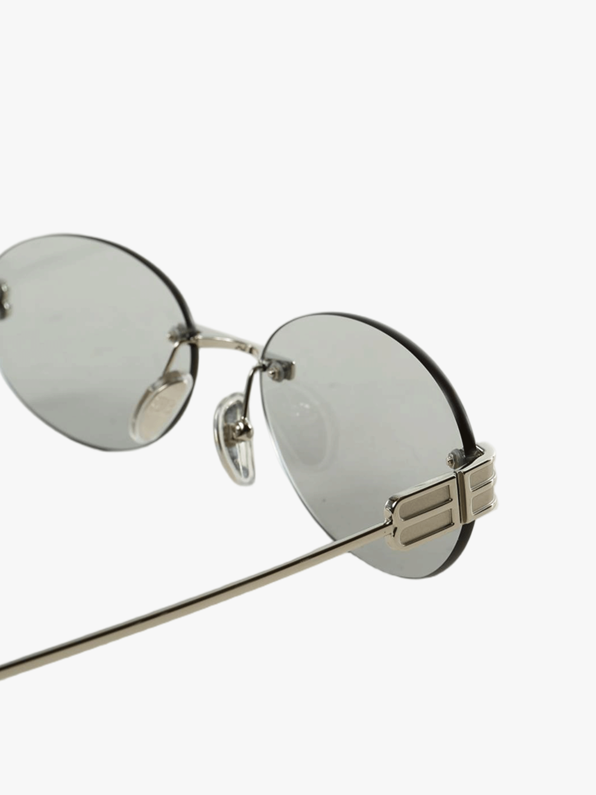 Close up of grey eyewear, showing texture of the fabric