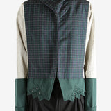 Green jacket worn by a person, showing the jacket's fit